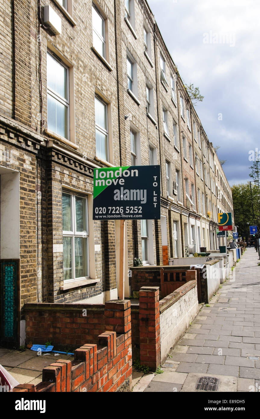 London move sign To Let  outside terraced houses in South London England United Kingdom UK Stock Photo