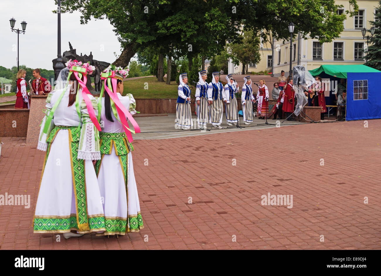 The Belarus folklore groups dance and sings on streets in Vitebsk Stock