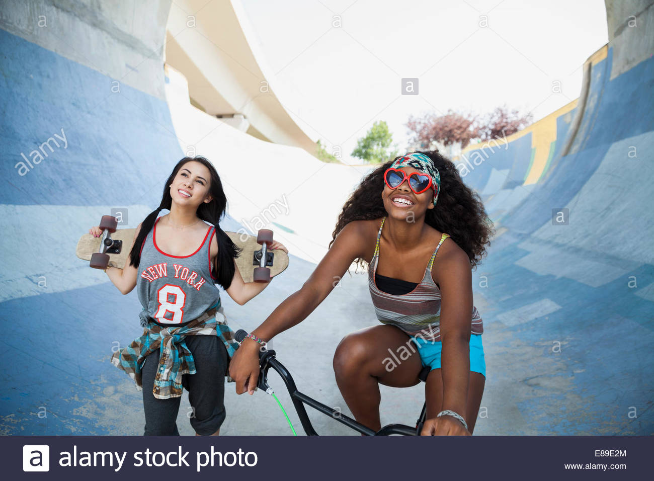 Teenage girls at skateboard park Stock Photo Alamy