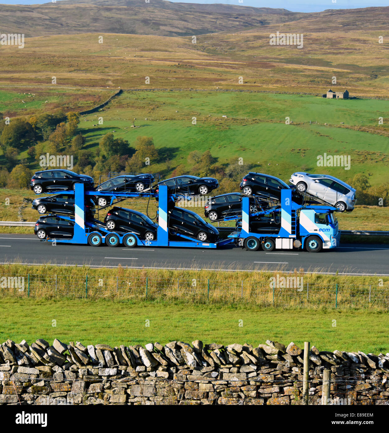 ECM Car Transporter. M6 Motorway, northbound. Shap, Cumbria, England, United Kingdom, Europe. Stock Photo