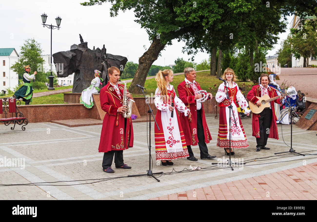 The Belarus folklore groups dance and sings on streets in Vitebsk Stock