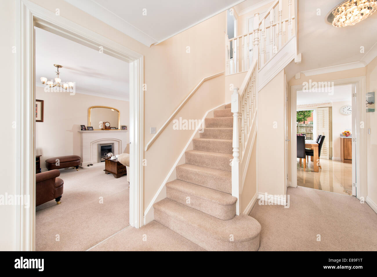 A tidy Entrance, hallway & stairs in a typical modern UK home Stock Photo