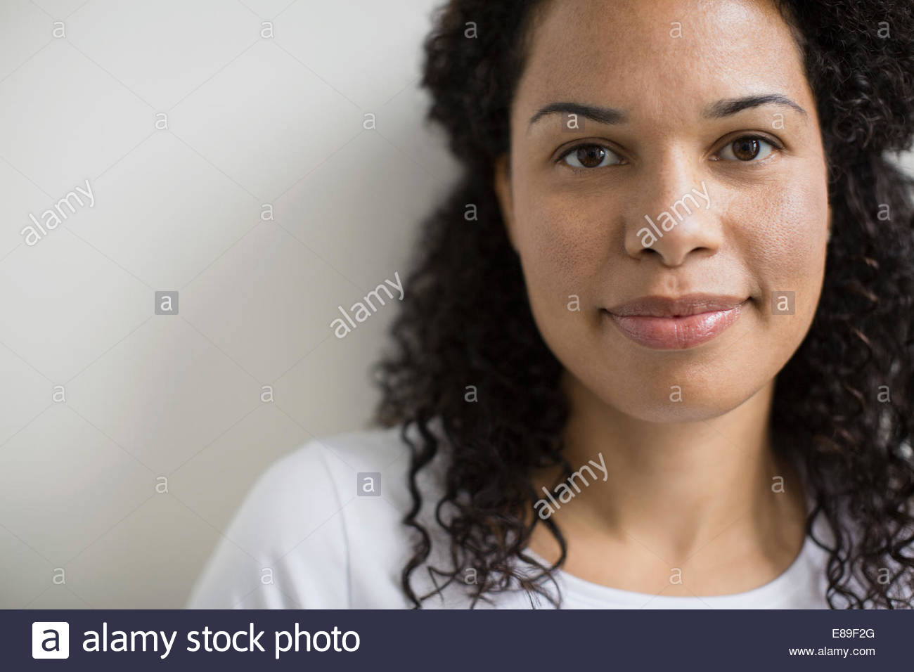 Black curly hair hi-res stock photography and images - Alamy