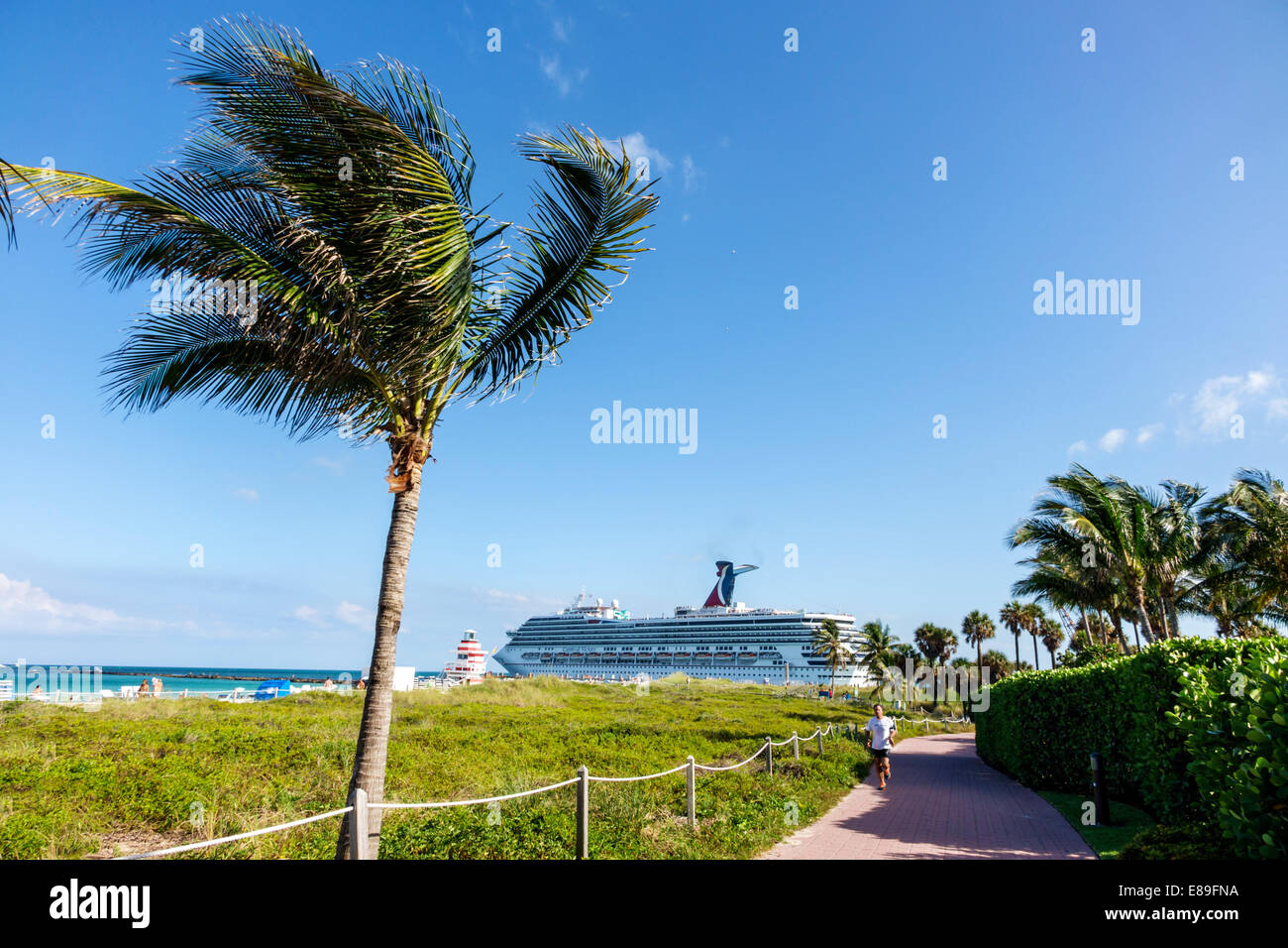 Miami Beach Florida,South Pointe Park,Point,Atlantic Ocean water,departing,cruise ship,Carnival Victory,visitors travel traveling tour tourist tourism Stock Photo