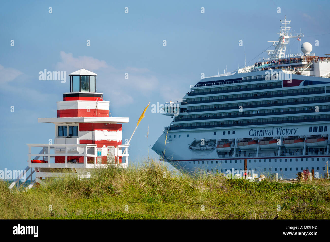 Miami Beach Florida,South Pointe Park,Point,Atlantic Ocean water,departing,cruise ship,Carnival Victory,lifeguard station,visitors travel traveling to Stock Photo