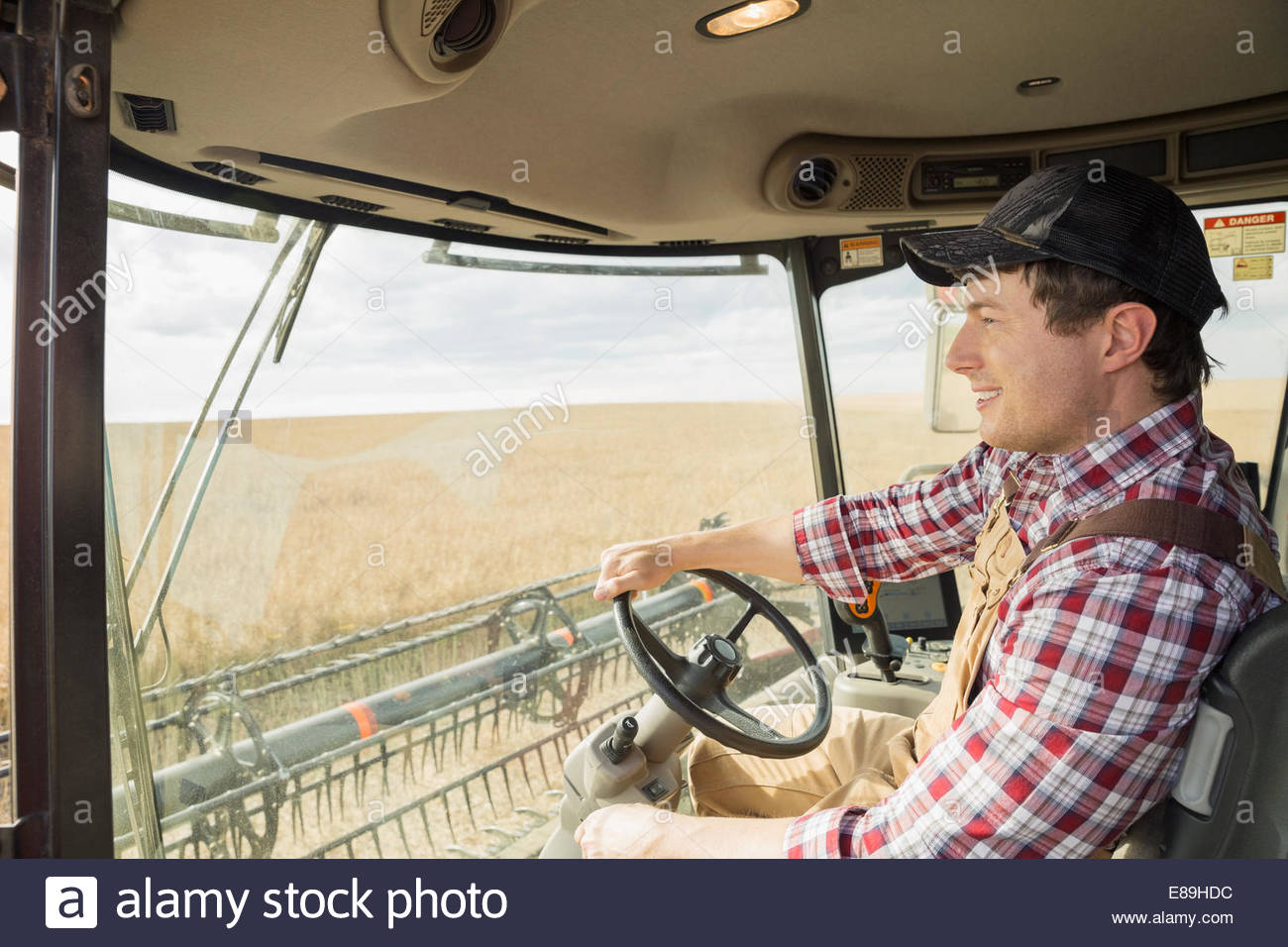 Man Driving Tractor Stock Photos & Man Driving Tractor Stock Images Alamy