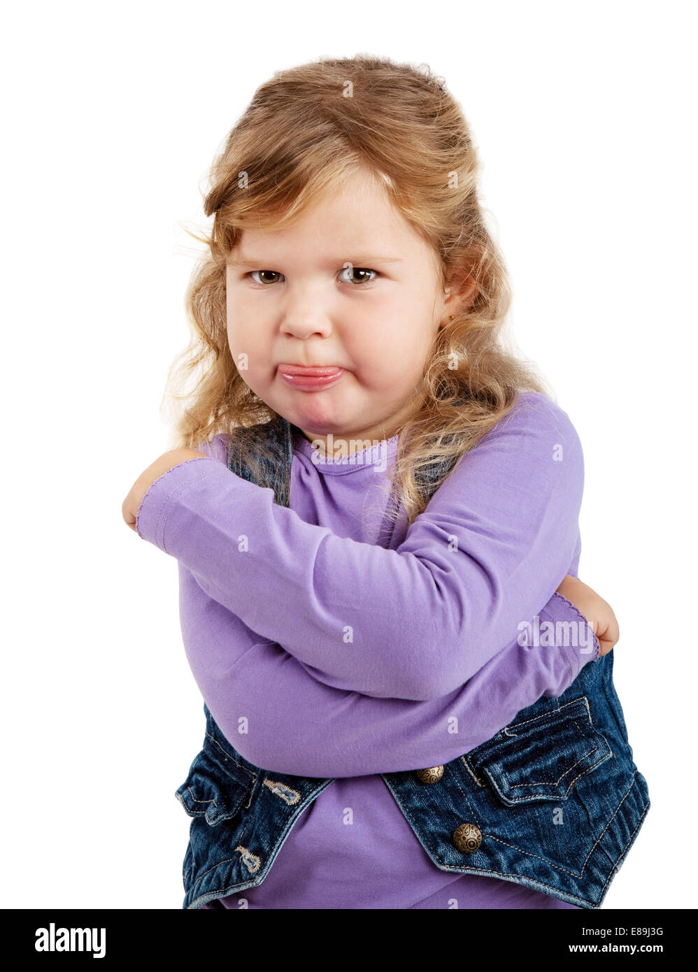 sulky angry young girl on white background Stock Photo