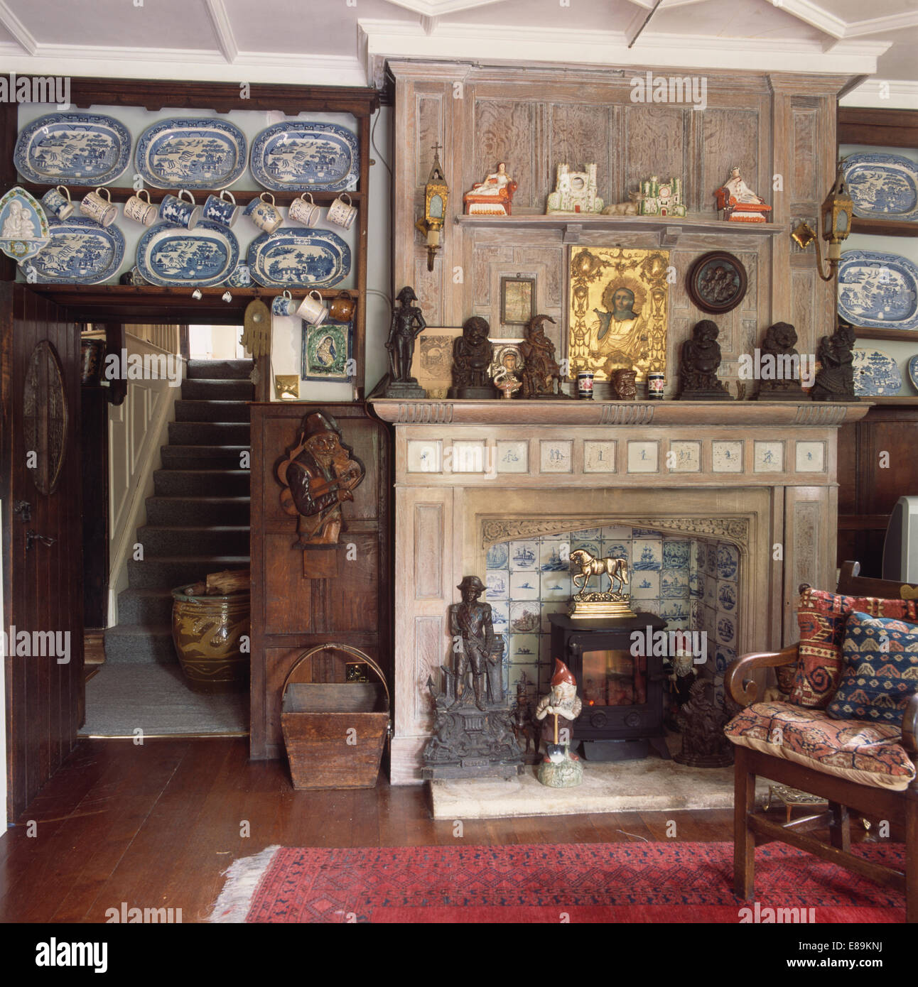 Panelled Fireplace In Country Livingroom And Blue And White Plate