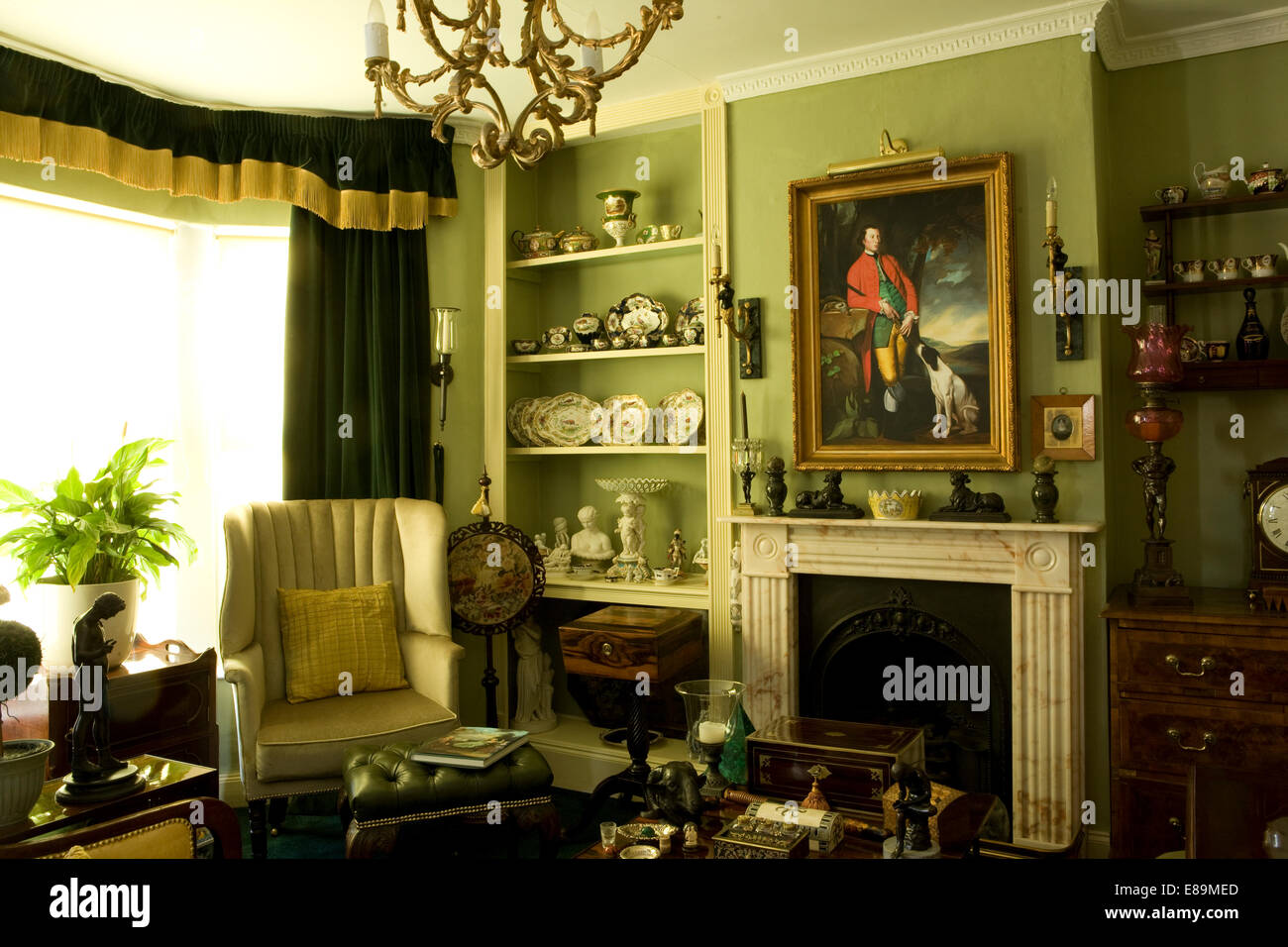 Traditional green drawing room with antique furniture Stock Photo - Alamy