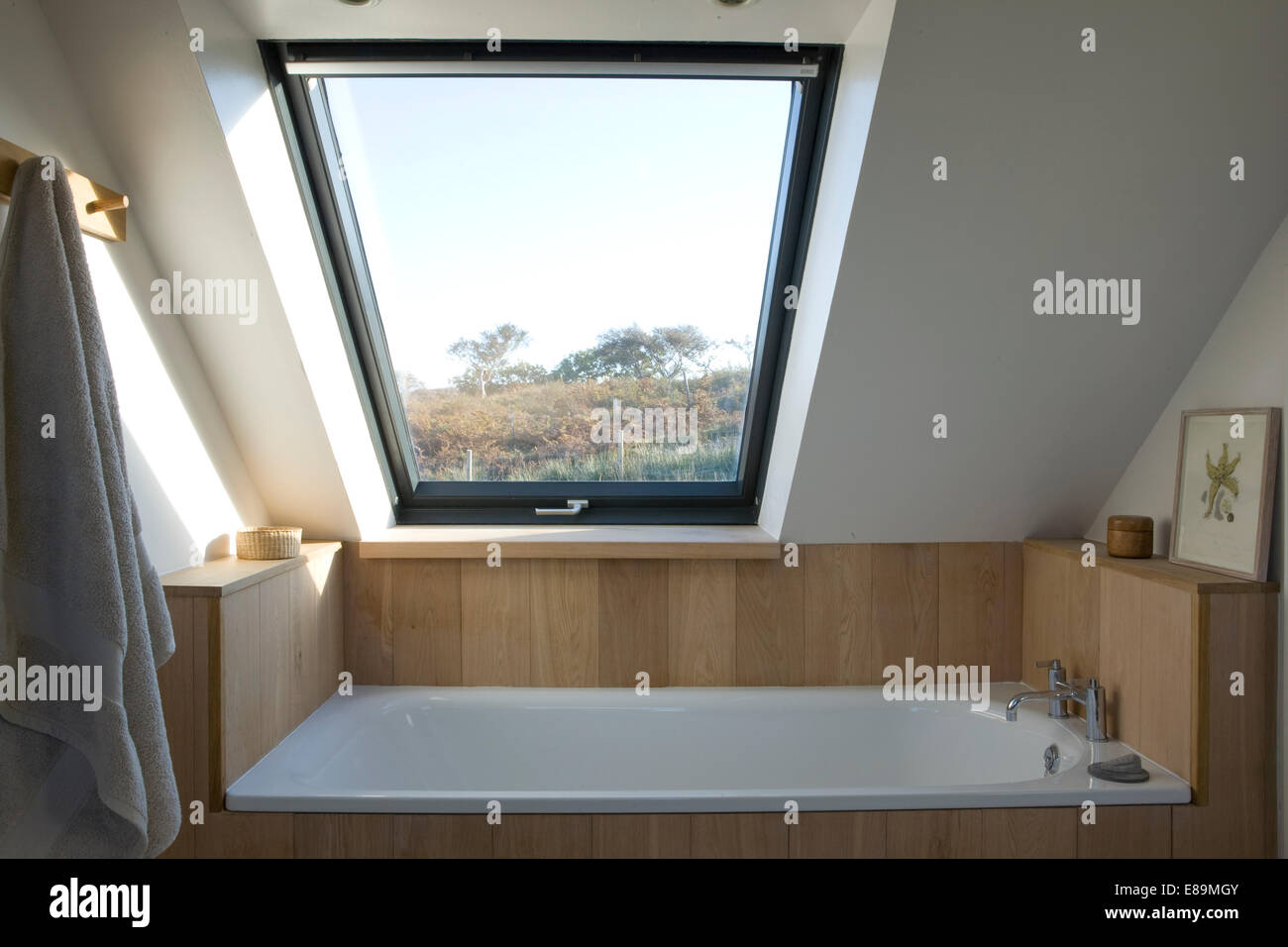 Velux window above bath in modern bathroom Stock Photo Alamy