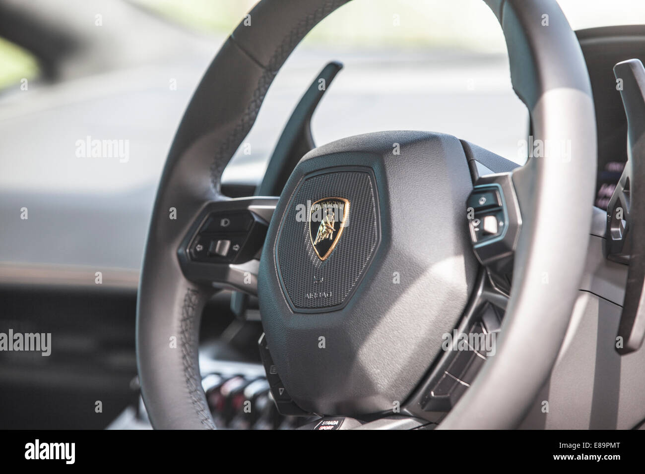 Aberdeen, Hong Kong, 18th Sep, 2014. View of the steering wheel of the new Lamborghini Huracan sports car, parked near a shipyard. Photoshoot for Asia Pacific Boating Magazine. Stock Photo