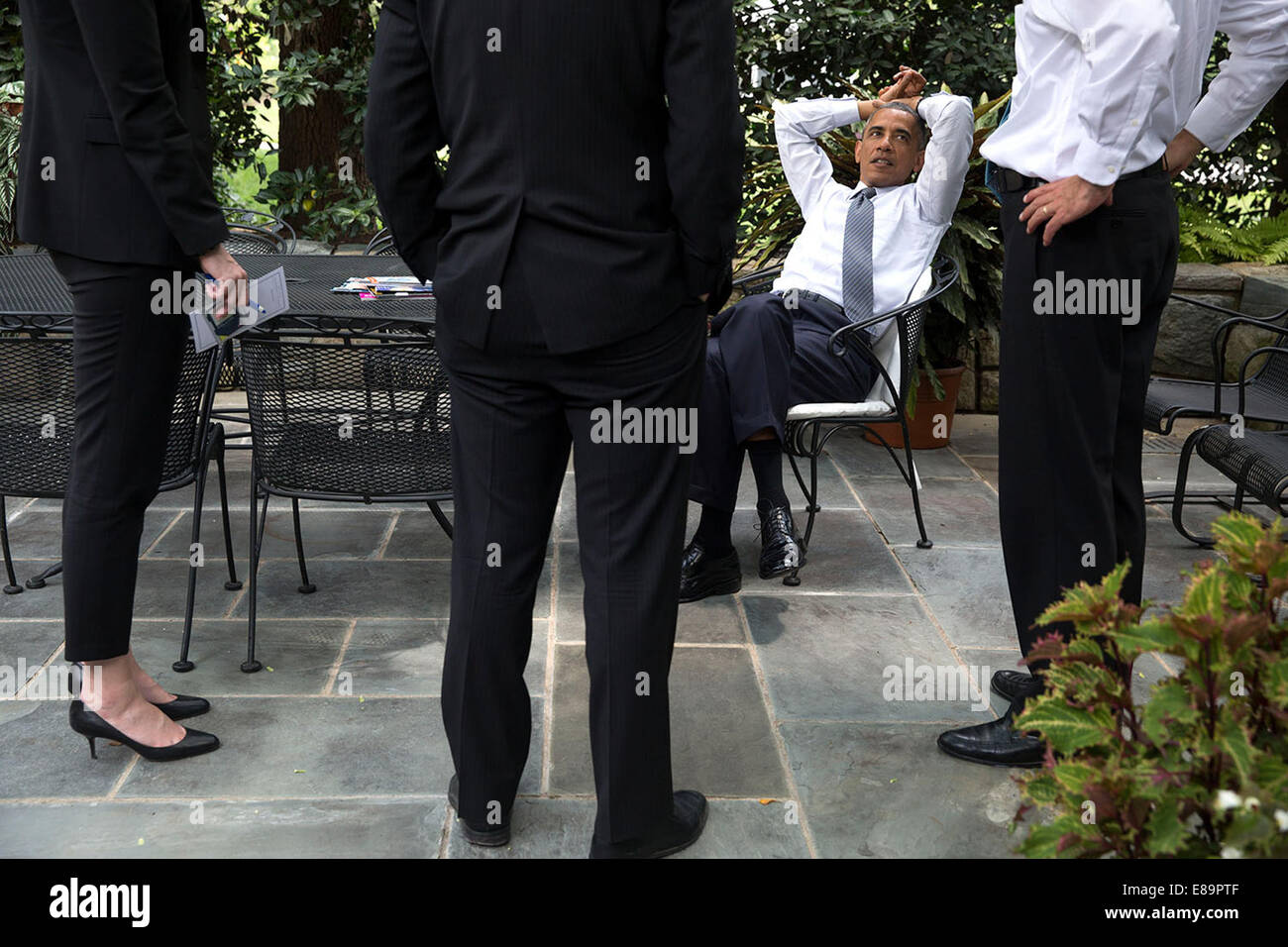 President Barack Obama talks with Chief of Staff Denis McDonough, right ...