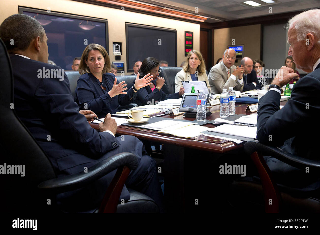 President Barack Obama and Vice President Joe Biden listen to Lisa ...