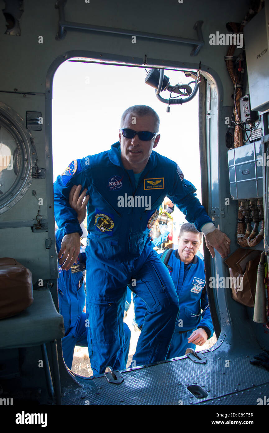 Commander Steve Swanson and Flight Engineers Alexander Skvortsov and ...