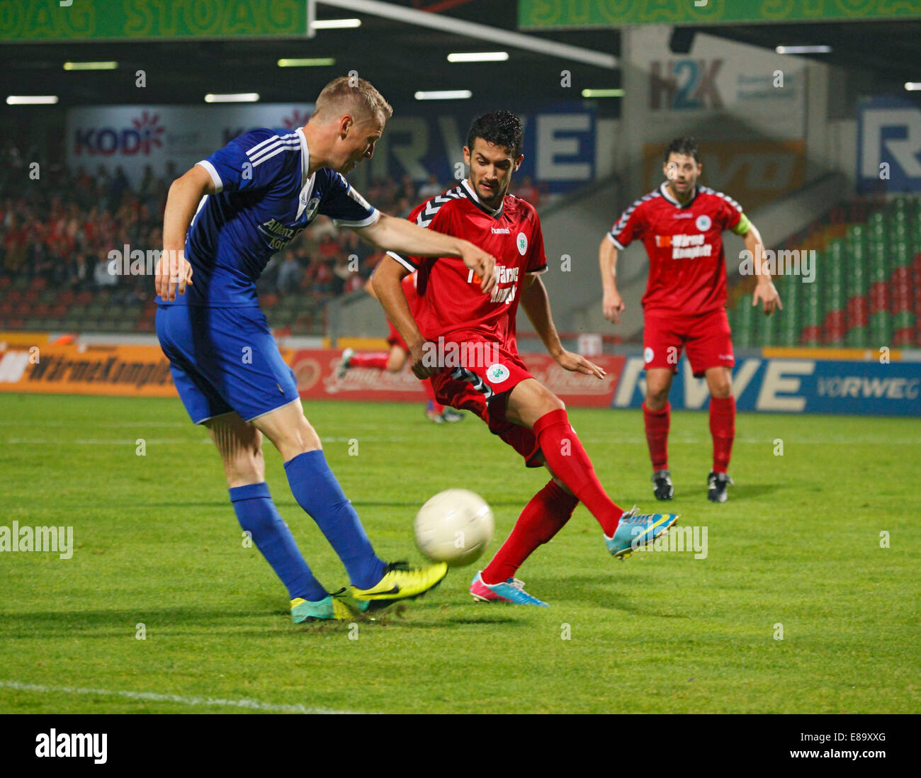 sports, football, Regional League West, 2014/2015, Rot Weiss Oberhausen versus VfL Sportfreunde Lotte 0:1, Stadium Niederrhein in Oberhausen, scene of the match, f.l.t.r. Henning Grieneisen (Lotte), Dominik Reinert (RWO), team captain Benjamin Weigelt (RWO) Stock Photo