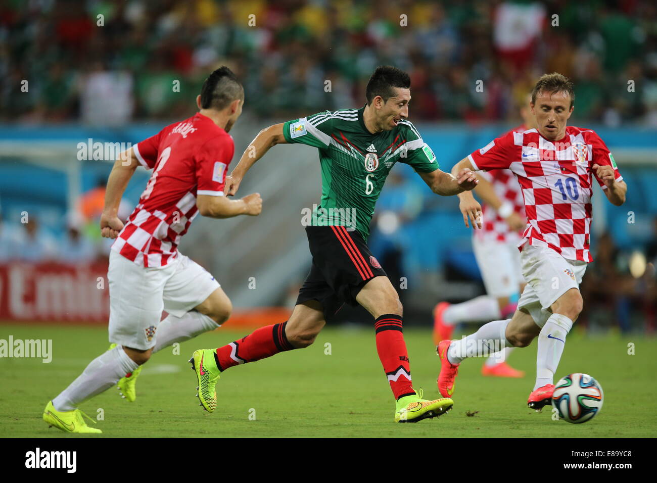 Hector Herrera of Mexico and Luka Modric of Croatia. Mexico v Croatia, group match. FIFA World Cup Brazil 2014. Arena Pernambuco Stock Photo