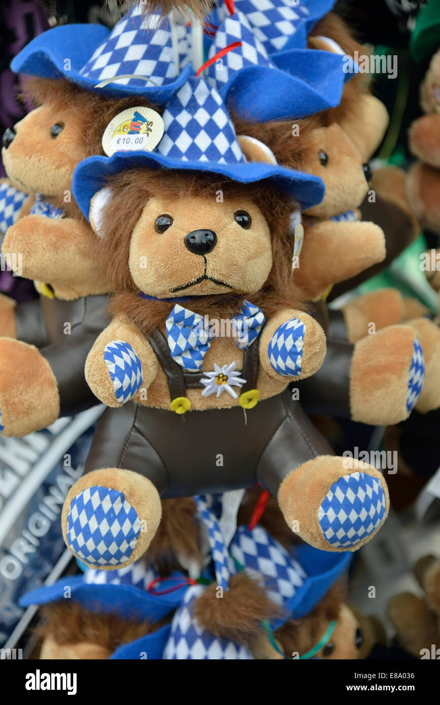 Teddy bear in traditional Bavarian dress on a stall, Oktoberfest, Munich, Upper Bavaria, Bavaria, Germany Stock Photo