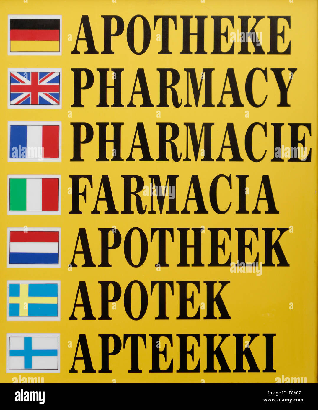 Multilingual sign of a pharmacy, Spain Stock Photo