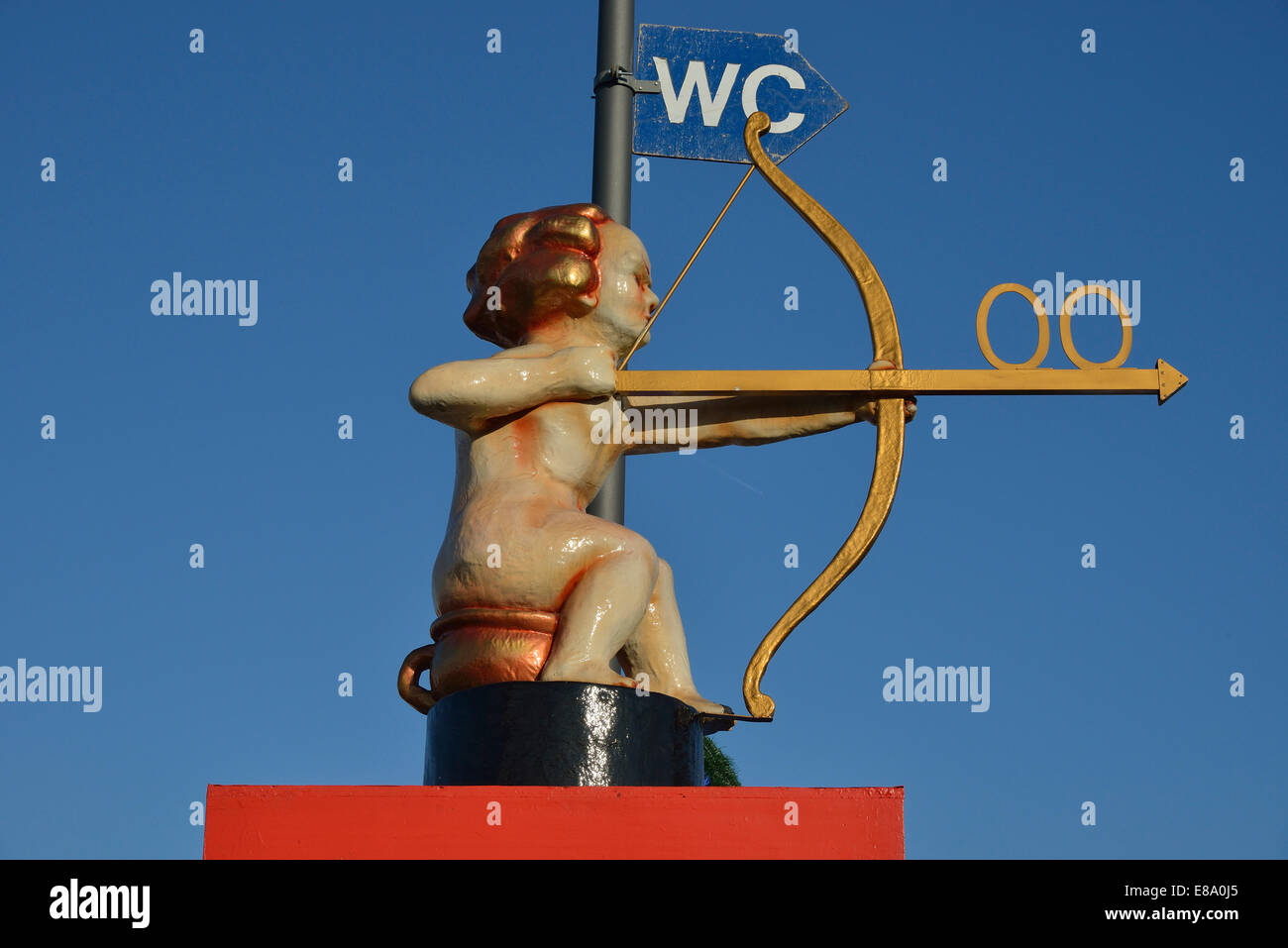 Archer Cupid as a toilet sign, Oktoberfest, Munich, Upper Bavaria, Bavaria, Germany Stock Photo