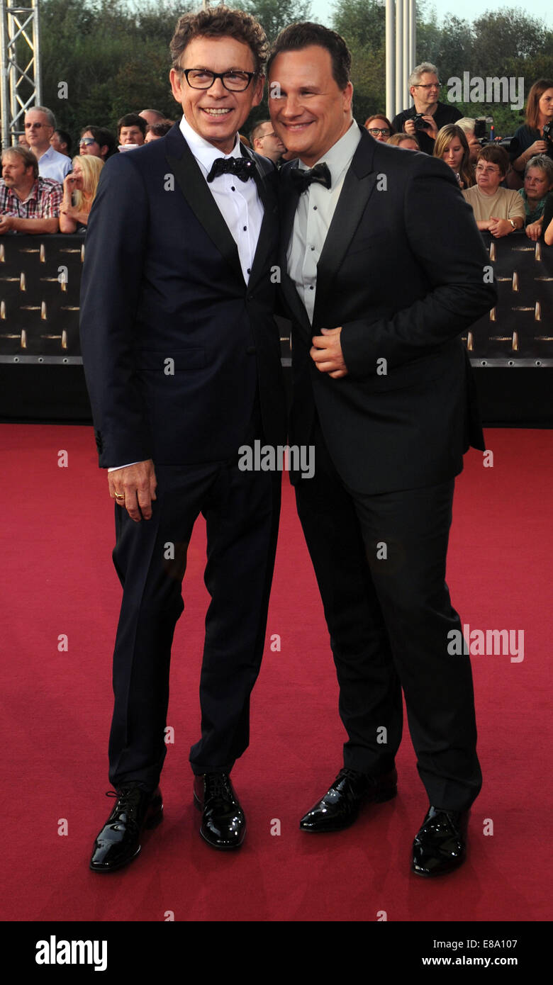 Cologne, Germany. 2nd October, 2014. Designer Guido Maria Kretschmer (R) arrives with his husband Frank Mutters for the 16th German Television Awards ceremony in Cologne, Germany, 2 October, 2014. Credit:  dpa picture alliance/Alamy Live News Stock Photo