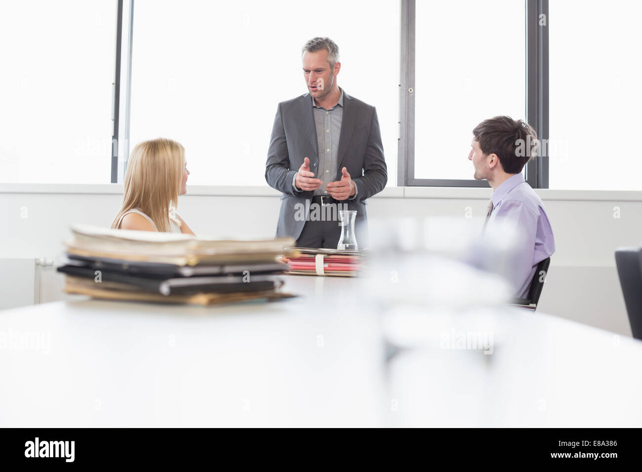business people having meeting in office Stock Photo - Alamy