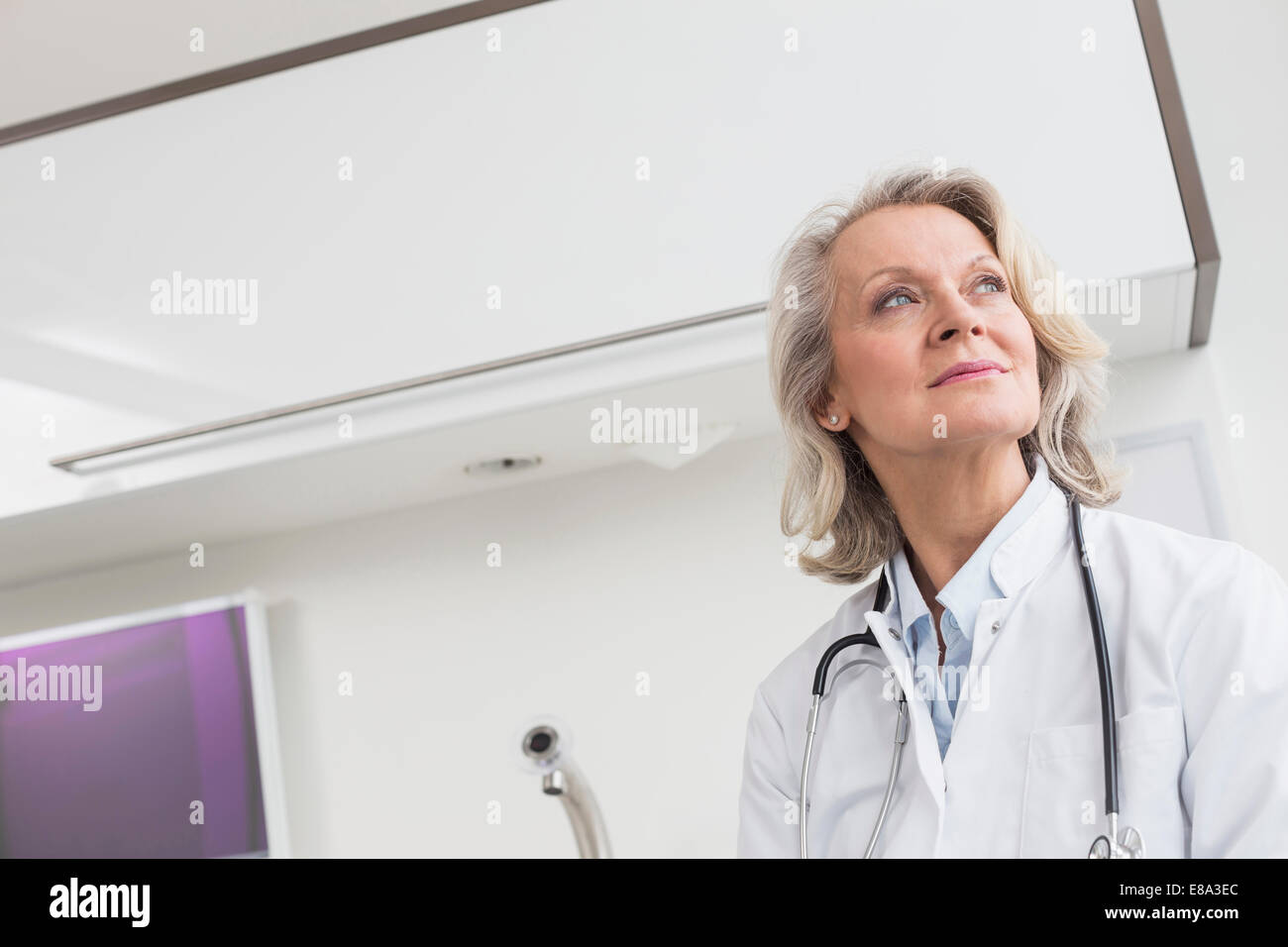 Portrait of senior doctor Stock Photo - Alamy