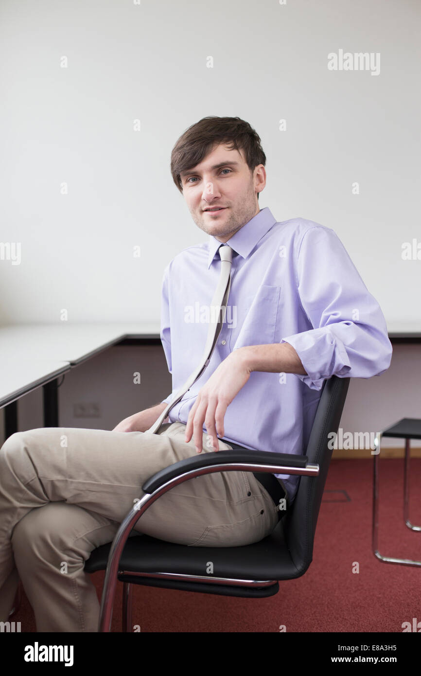 Portrait of businessman in office, smiling Stock Photo - Alamy