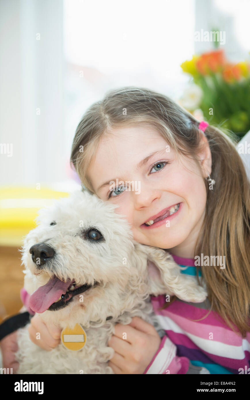 Portrait of girl with her dog, smiling Stock Photo - Alamy