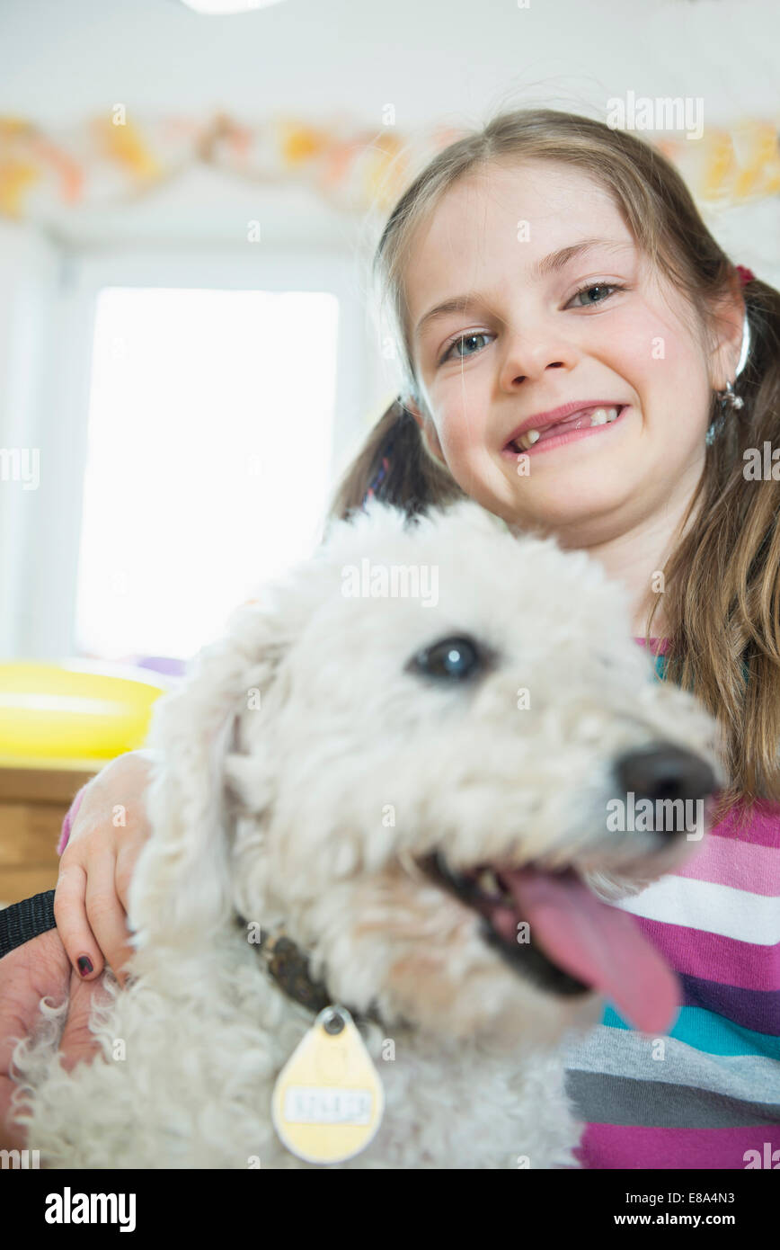 Portrait of girl with her dog, smiling Stock Photo - Alamy