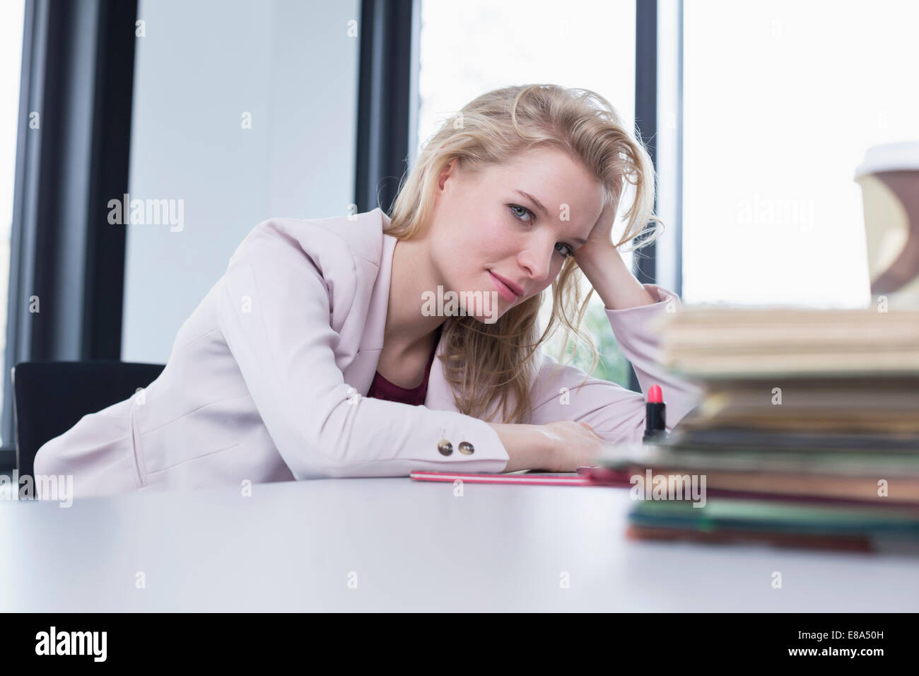 Portrait of businesswoman in office, smiling Stock Photo - Alamy