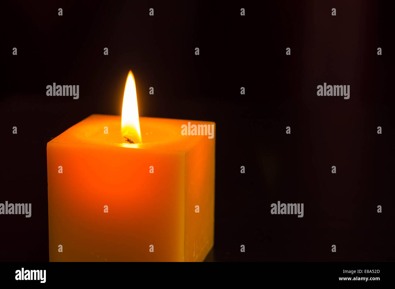 Burning candle Stock Photo