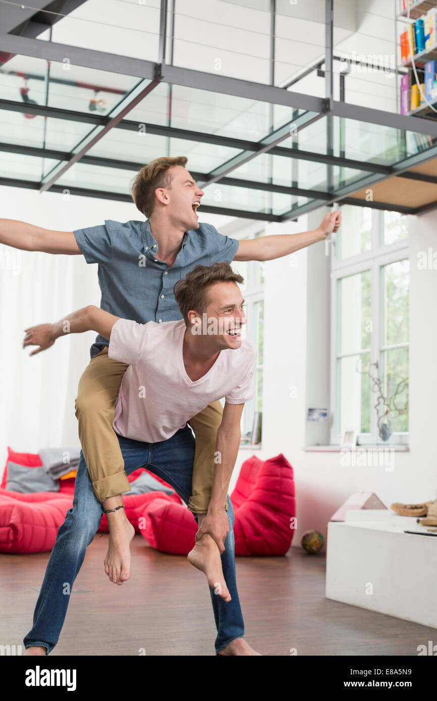 Lovely Gay Couple On Piggyback Ride Stock Photo 1892144086