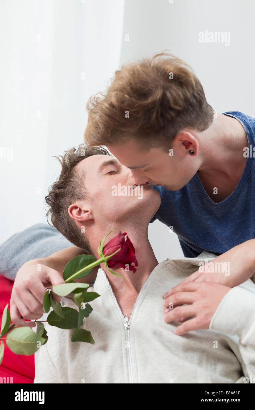 Homosexual couple kissing each other Stock Photo