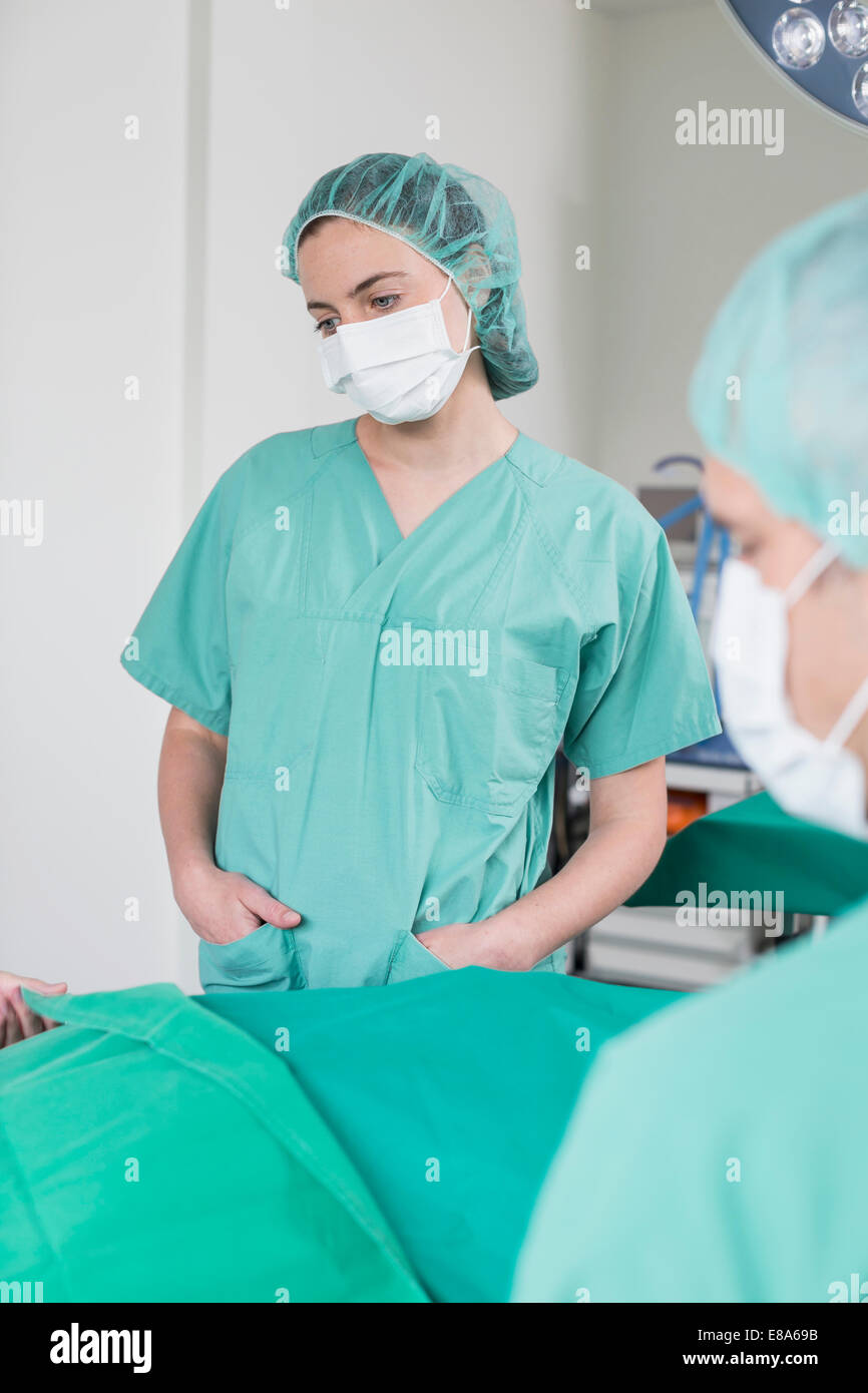 Patient lying on an operating table hires stock photography and images Alamy