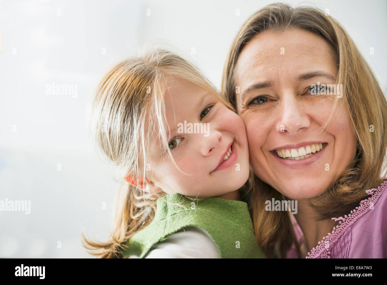 Mother and daughter embracing Stock Photo Alamy