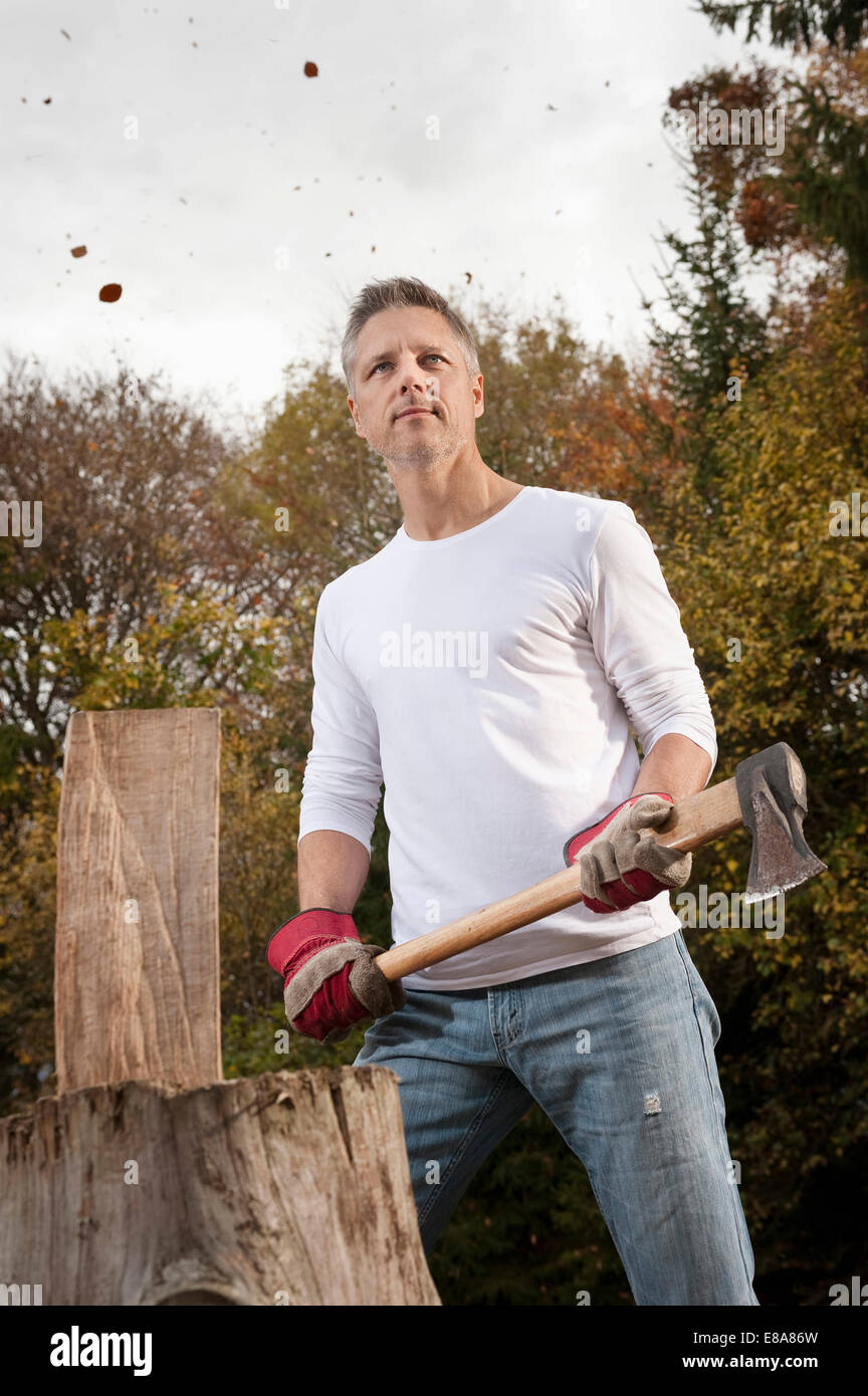 Man chopping wood Stock Photo Alamy