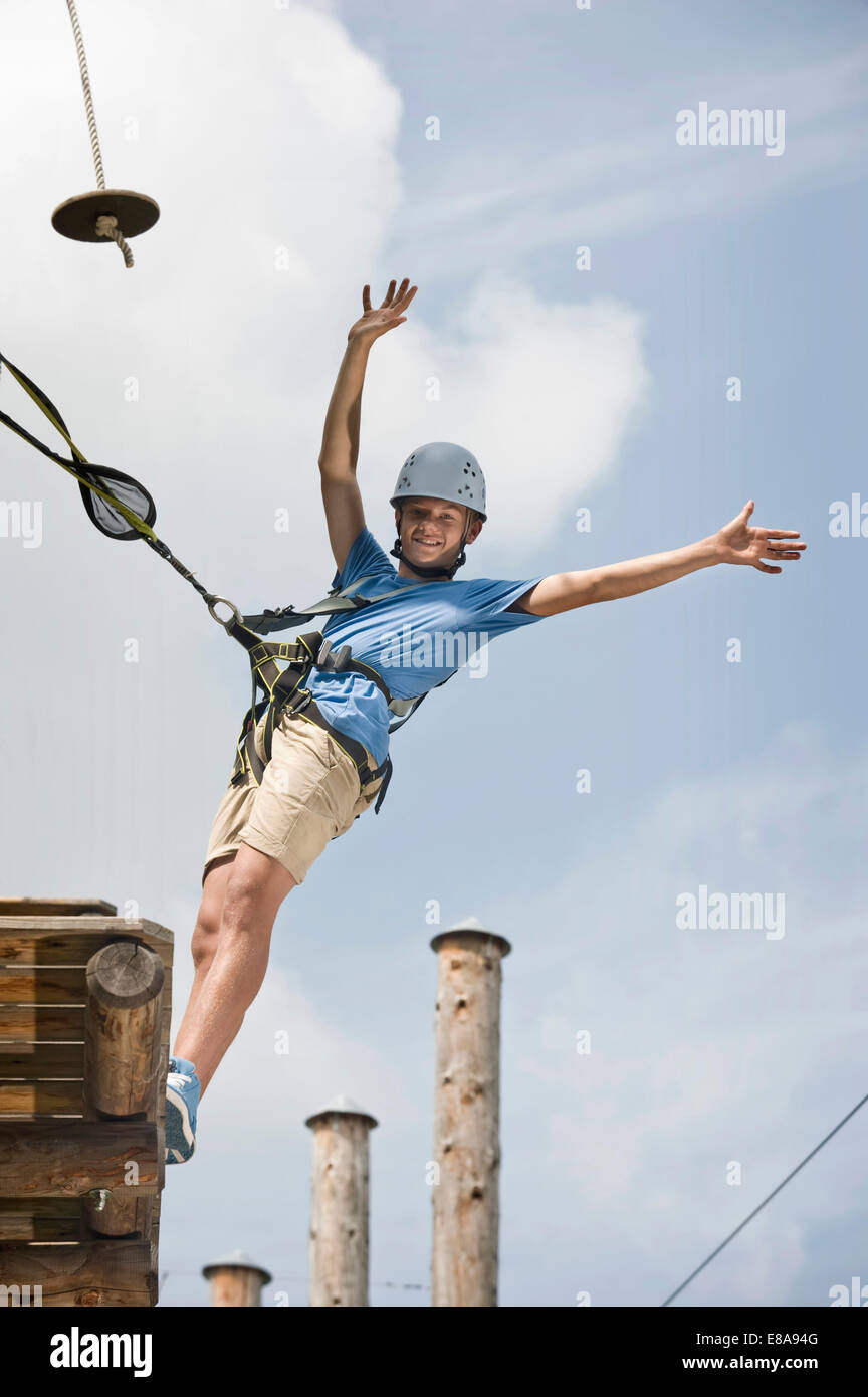 teenager balancing in a climbing crag Stock Photo Alamy