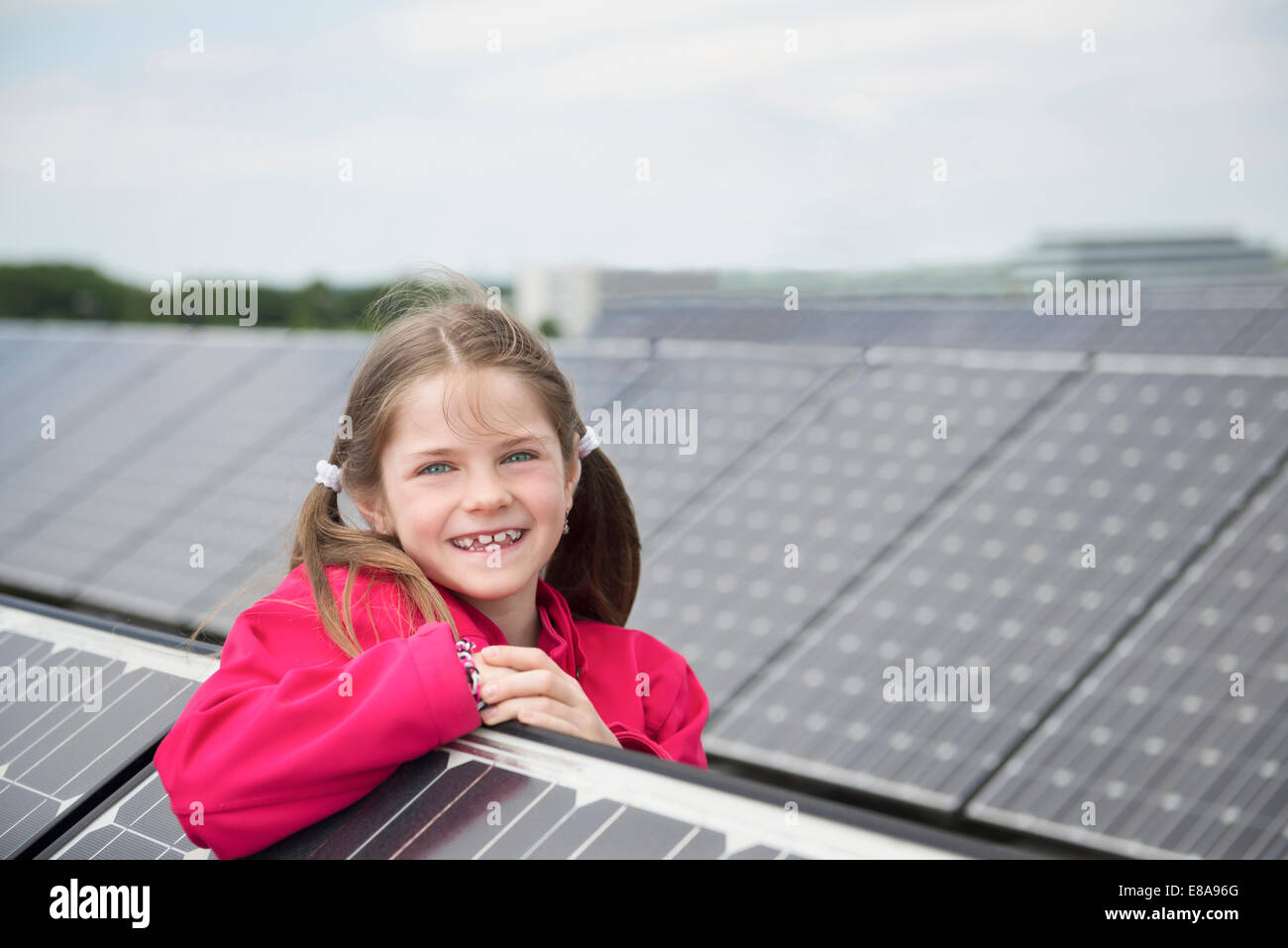 Portrait young girl smiling solar cell park Stock Photo