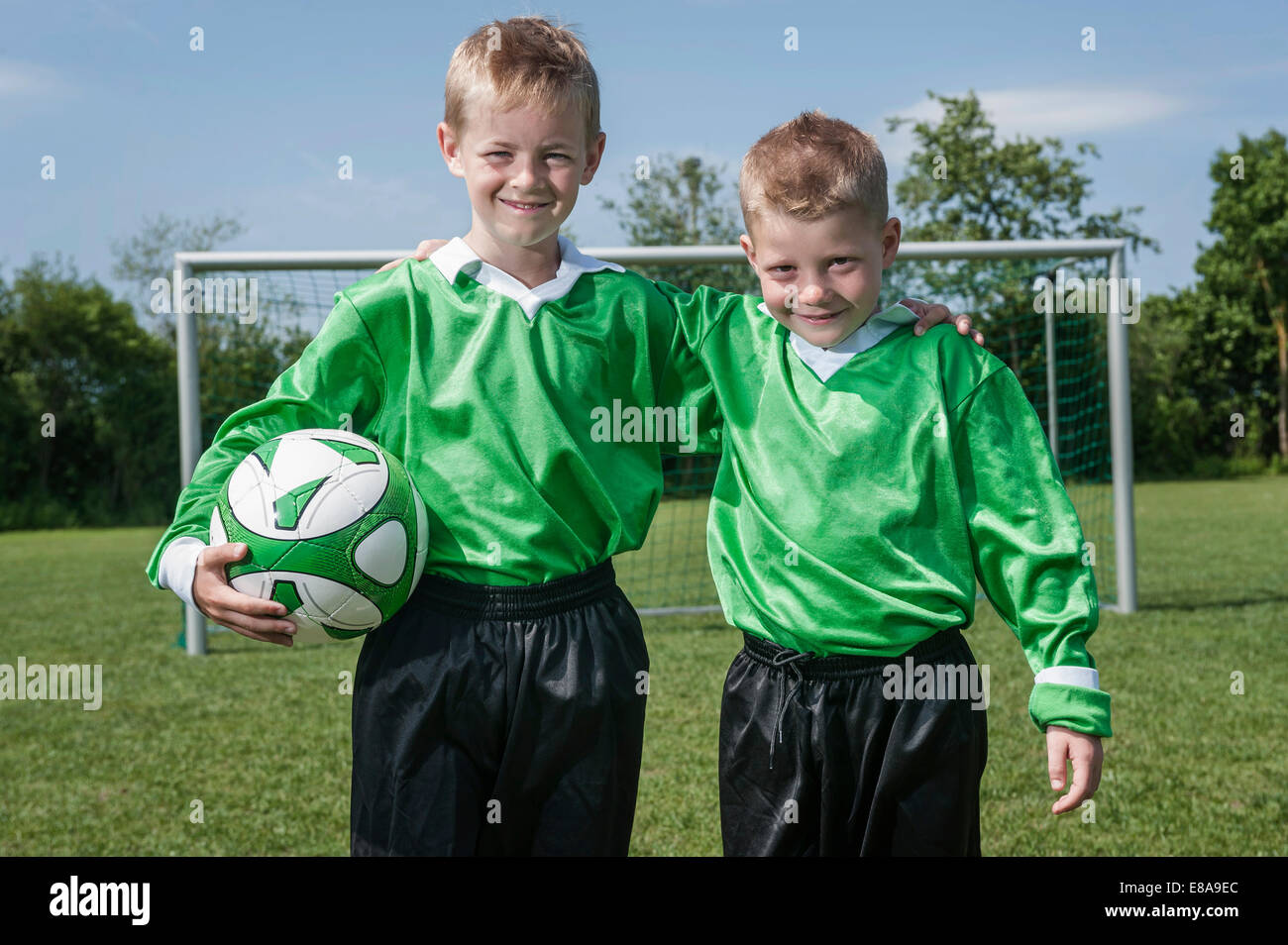 Two boys young soccer players posing portrait Stock Photo Alamy