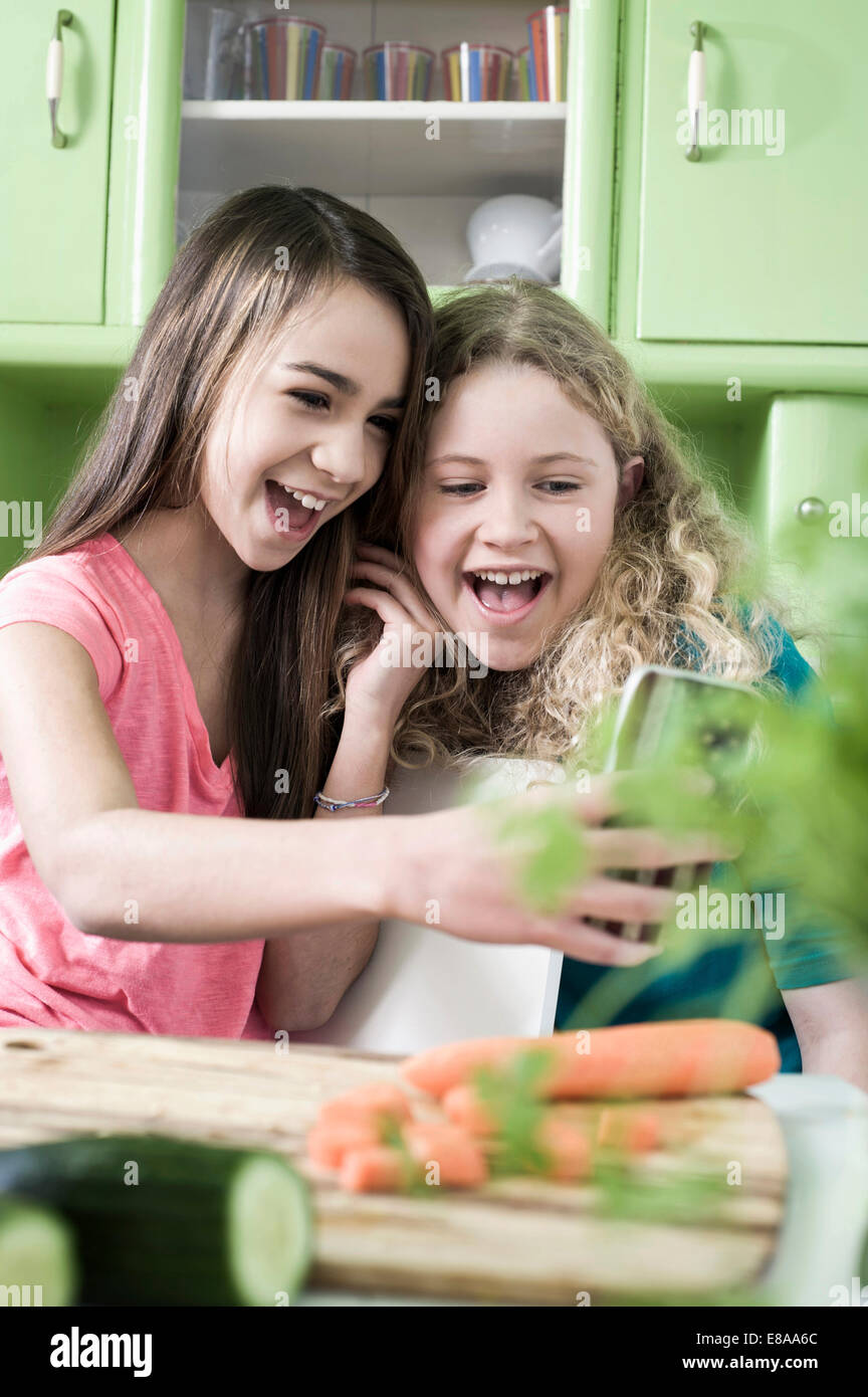 Girl in kitchen Stock Photo Alamy