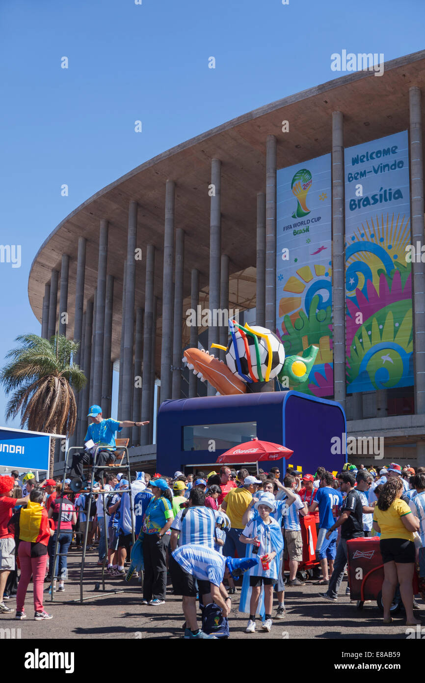 Football fans outside National Mane Garrincha Stadium for World Cup match, Brasilia, Federal District, Brazil Stock Photo