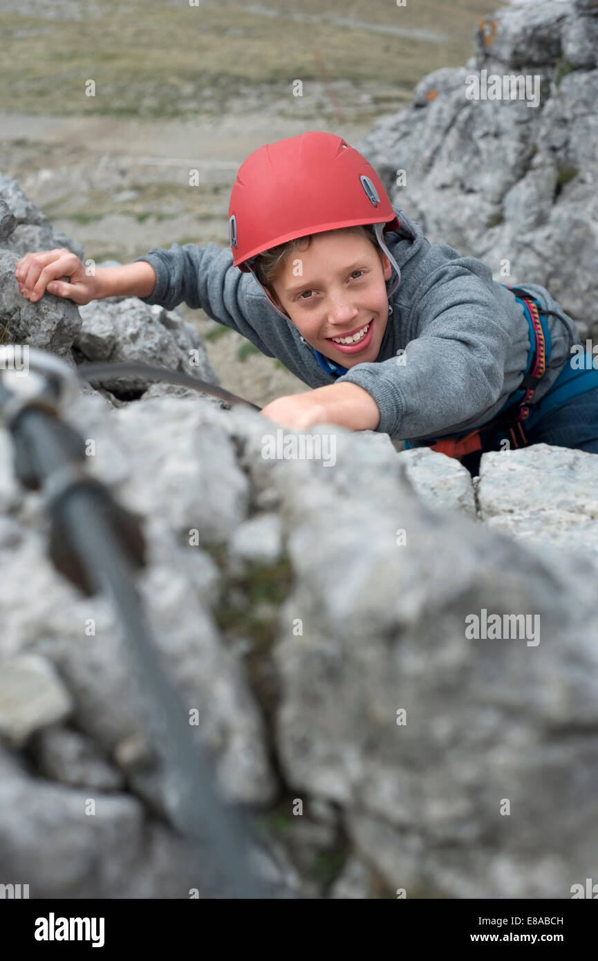 Teenage boy helmet safety harness climbing Stock Photo - Alamy