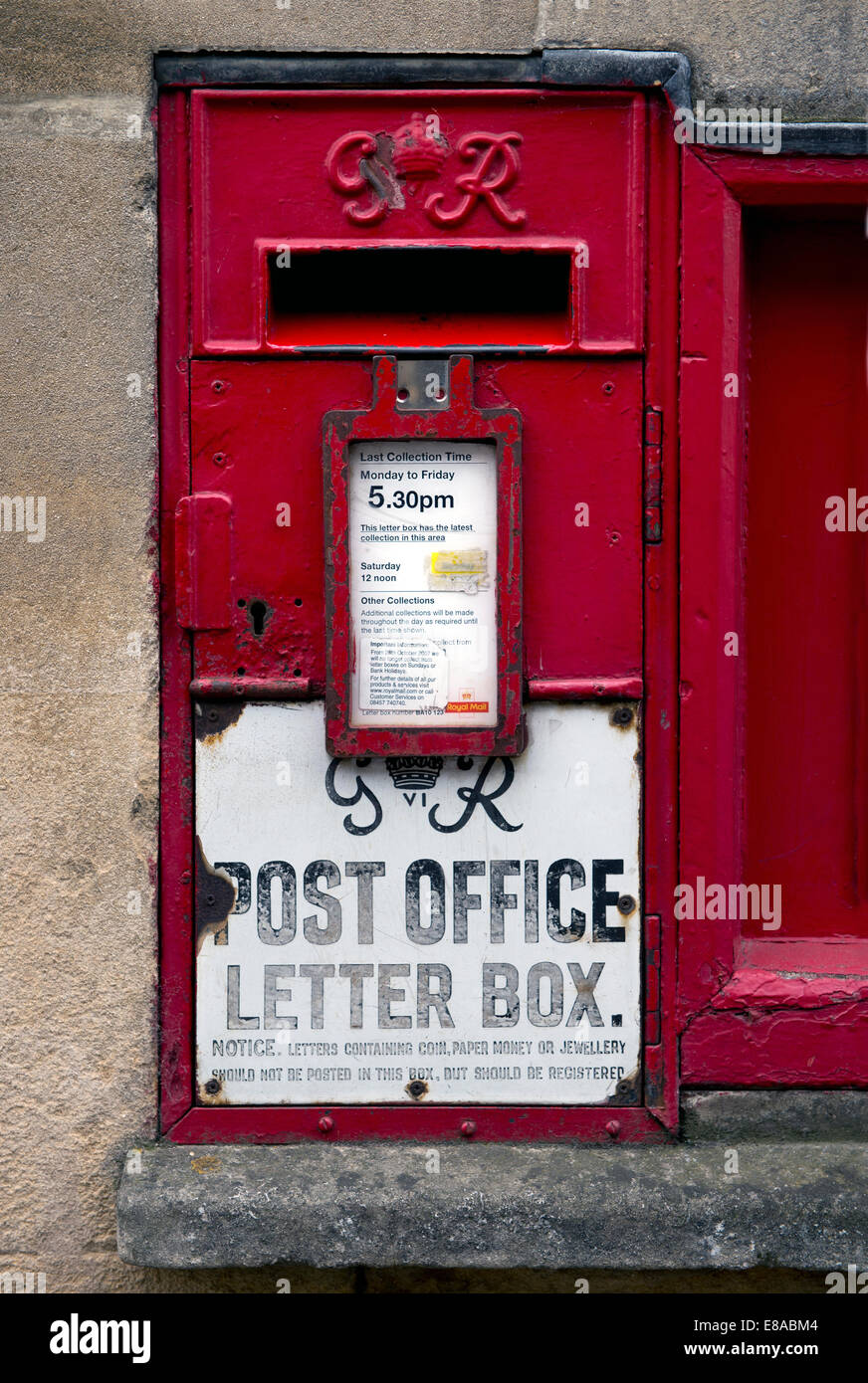 A letter box in the High Street of the Somerset village of Bruton UK Stock Photo