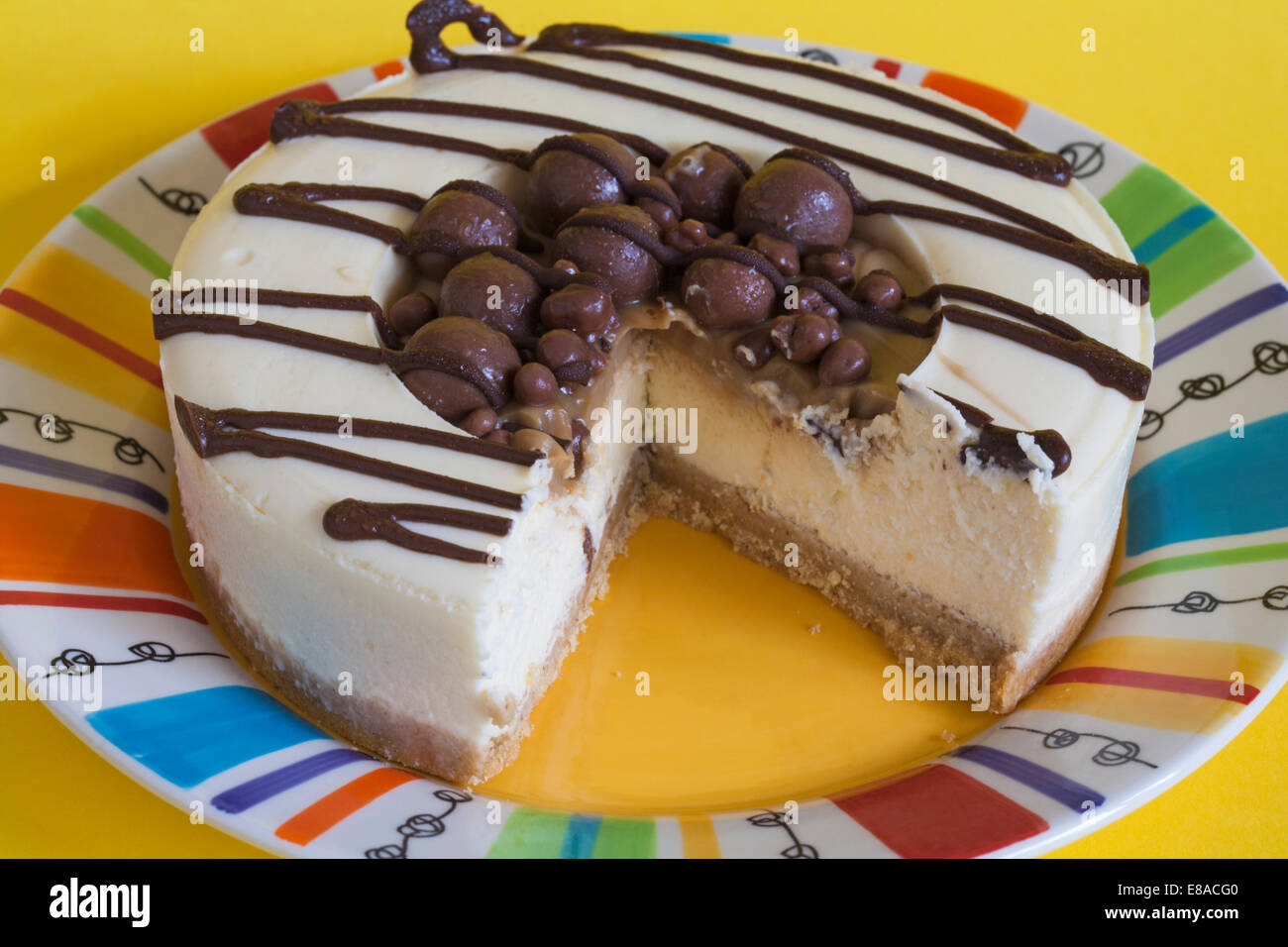 Marks & Spencer sunken salted caramel cheesecake with piece cut out on