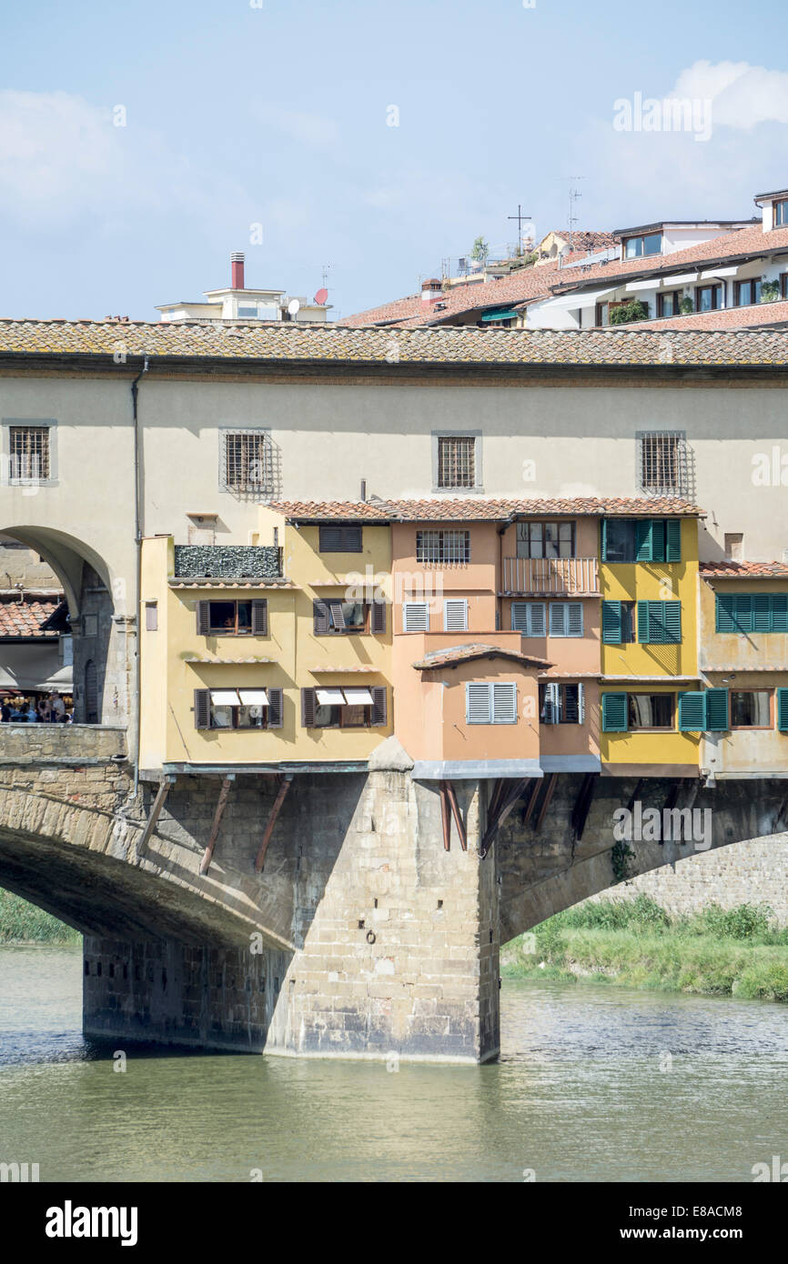 detail viewof Ponte Vecchio with colorful built out sections to house expensive shops Florence Firenze Italy Stock Photo