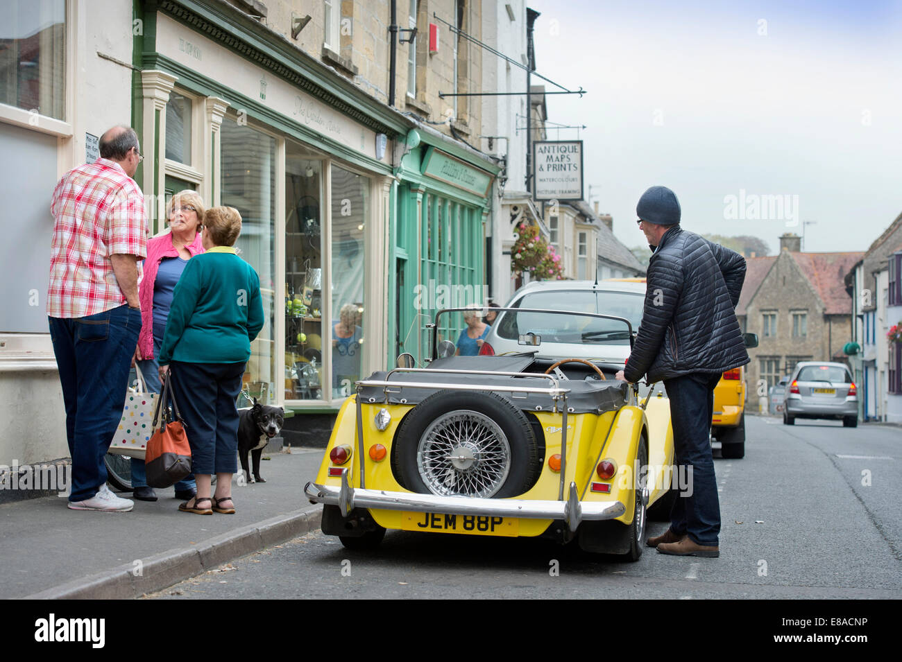 A classic car in the High Street of the Somerset village of