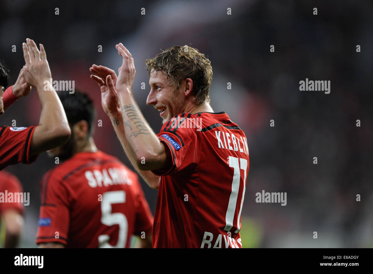 Leverkusen, Germany, 1st October, 2014. UEFA Champions League 2014/2015  Group stage Group C matchday 2, Bayer 04 Leverkusen (red) - Benfica  Lissabon (black) --- Heung-Min Son (Leverkusen) and Stefan Kie§ling  (Kiessling) (Leverkusen)