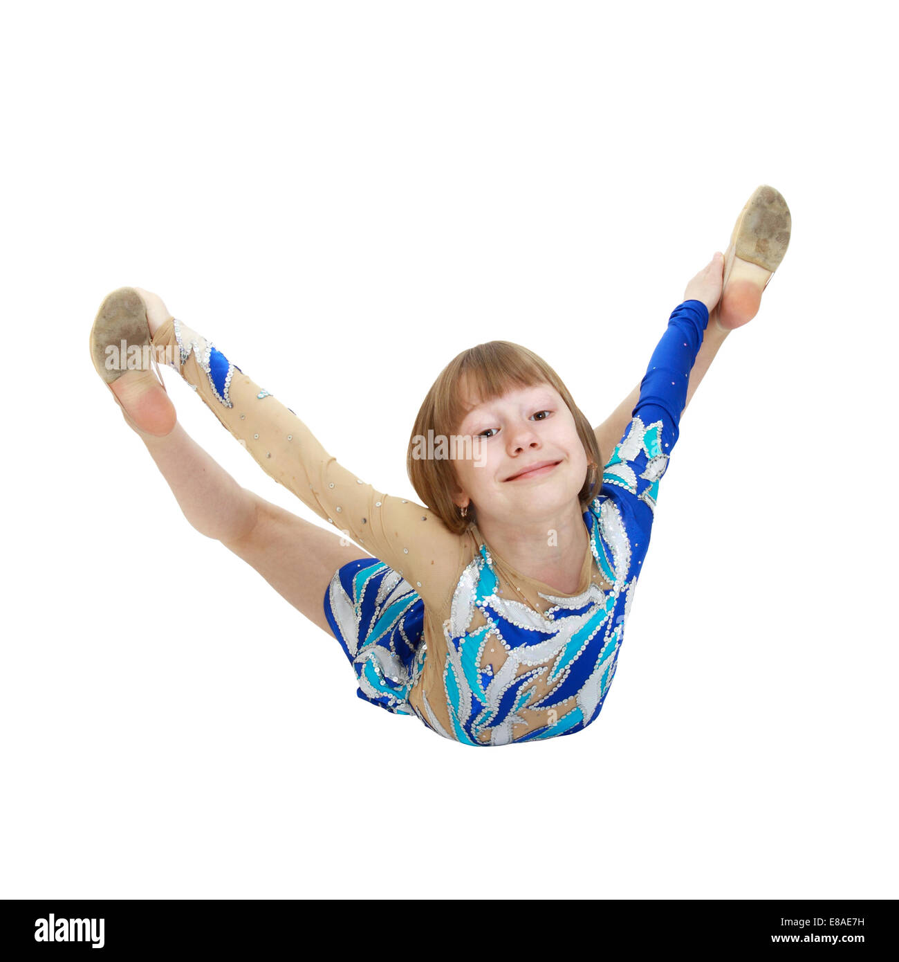 Girl in gymnastic exercise position isolated on white background Stock Photo