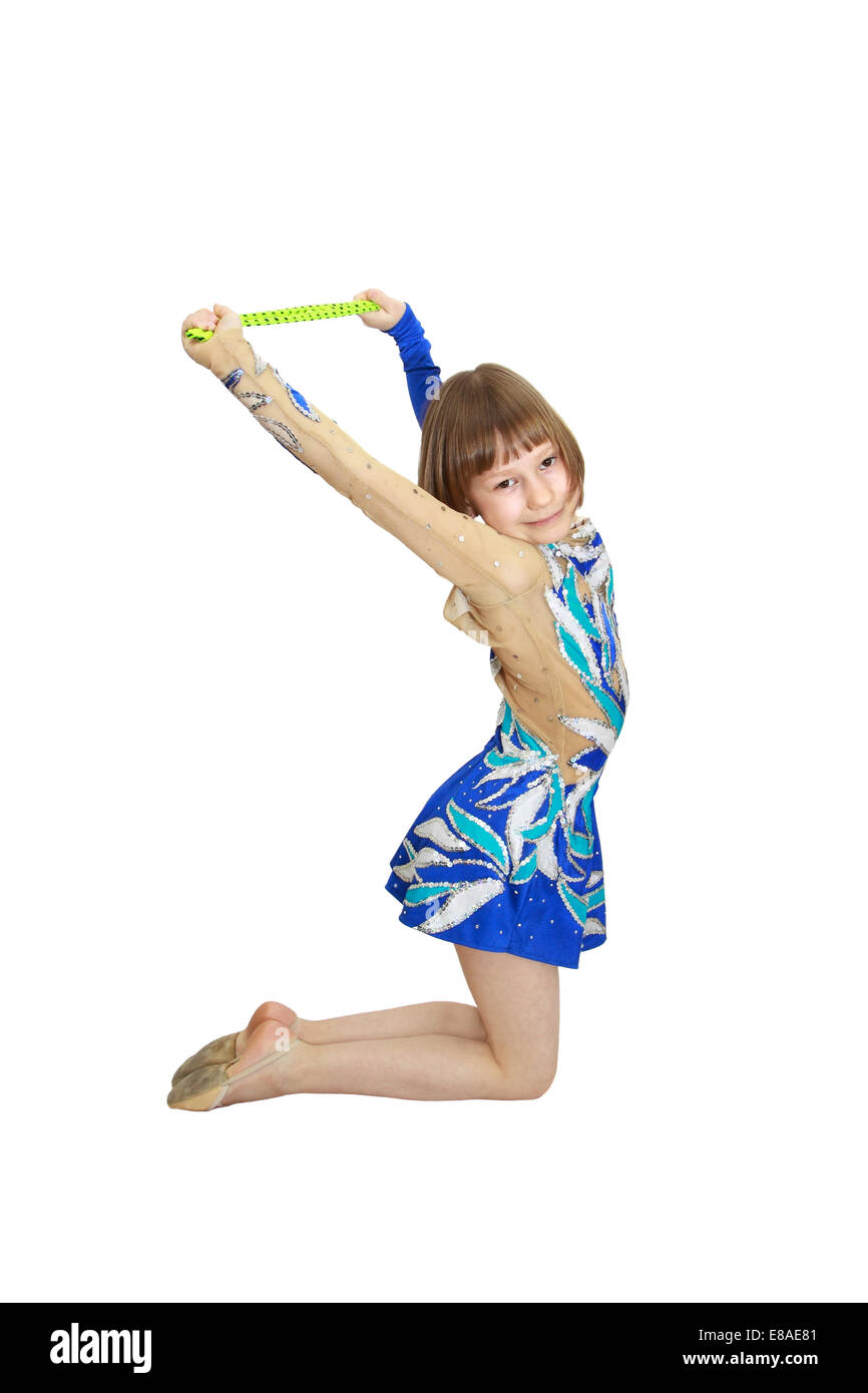 Girl in gymnastic exercise position with rope isolated on white background Stock Photo
