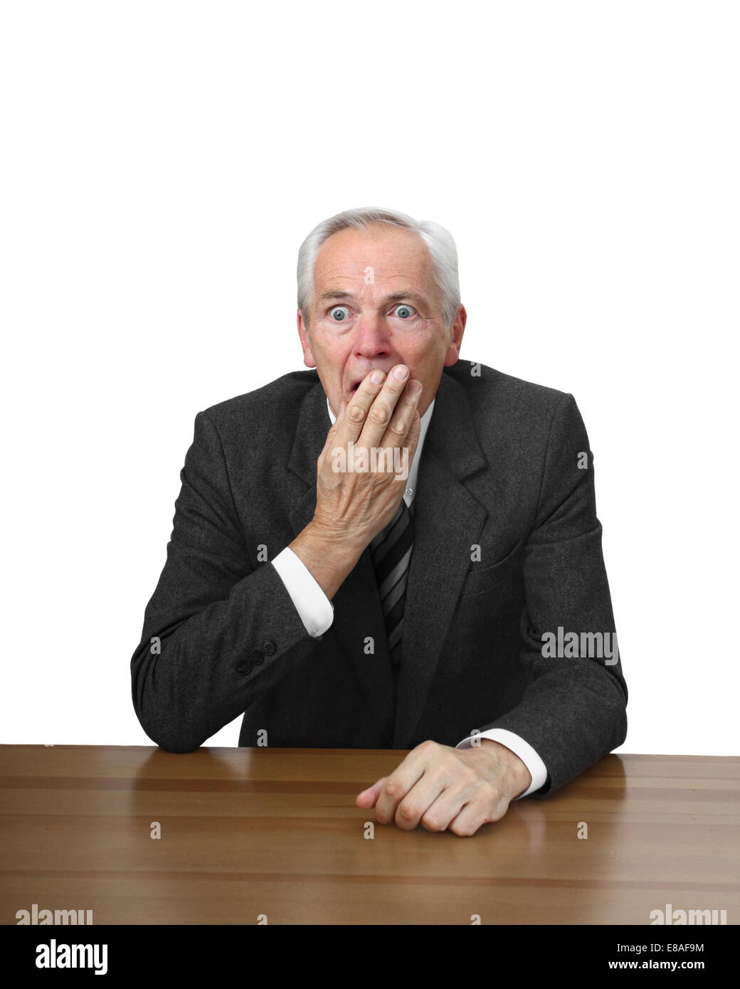 Shocked man covering mouth suit hi-res stock photography and images - Alamy
